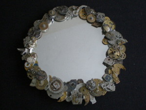 Mirror made from watch parts