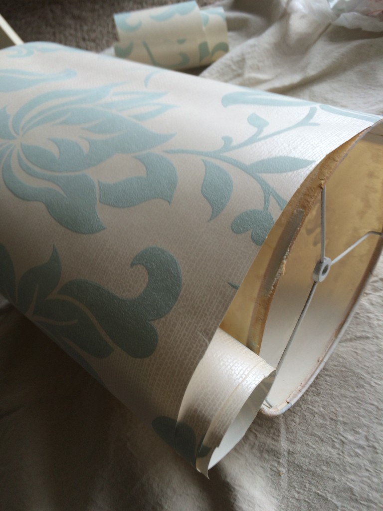 laying lampshade on wallpaper to cut to fit