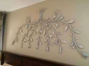 Floral metal wall art painted and distressed