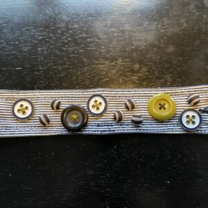 Handmade cuff bracelet with button accents